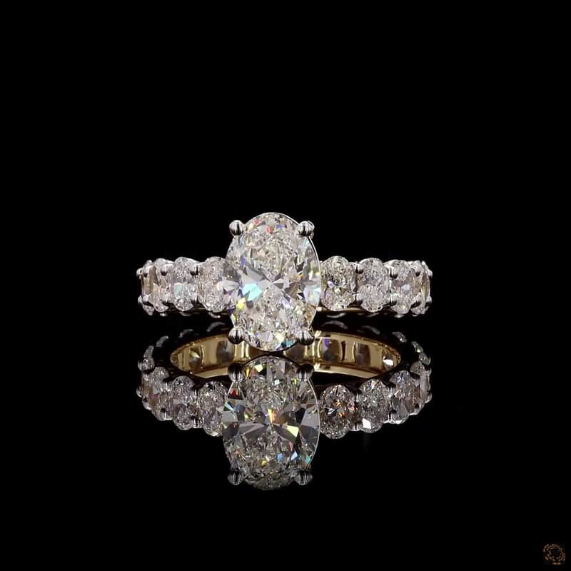 Oval Side-Stone Solitaire Ring